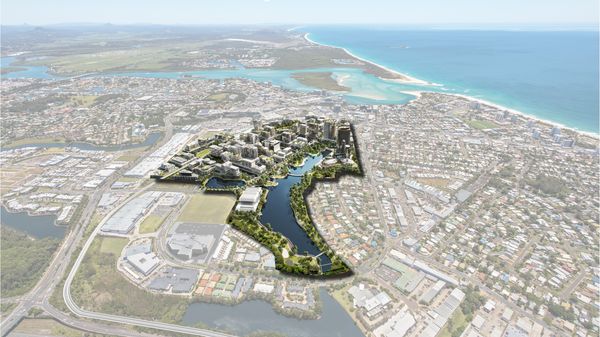 An aerial view of Maroochydore and the surrounding region, including an artist’s impression of the future Maroochydore City Centre development in the centre, with the prominent wide waterway running through the heart of the city centre, and the nearby seaway and broadwater area a few streets further in the distance connecting to the nearby ocean. In the lower area the motorway is visible close to the precinct, linked to the nearby precinct via a short major road.